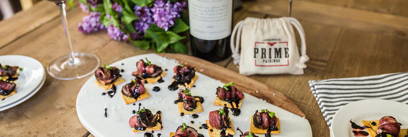 LAMB CARPACCIO CROSTINI WITH BLACKBERRY BALSAMIC REDUCTION